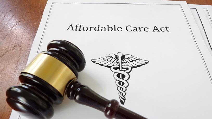 Image of judges gavel and document showing Affordable Care Act Image of judges gavel and document showing Affordable Care Act